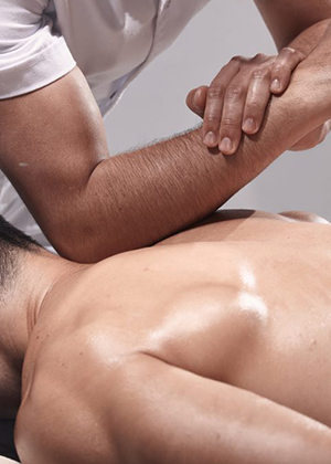 Pressure on back by massage specialist